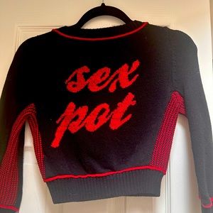 Betsy Johnson 1990’s fitted and cropped “Sex Pot” sweater.
